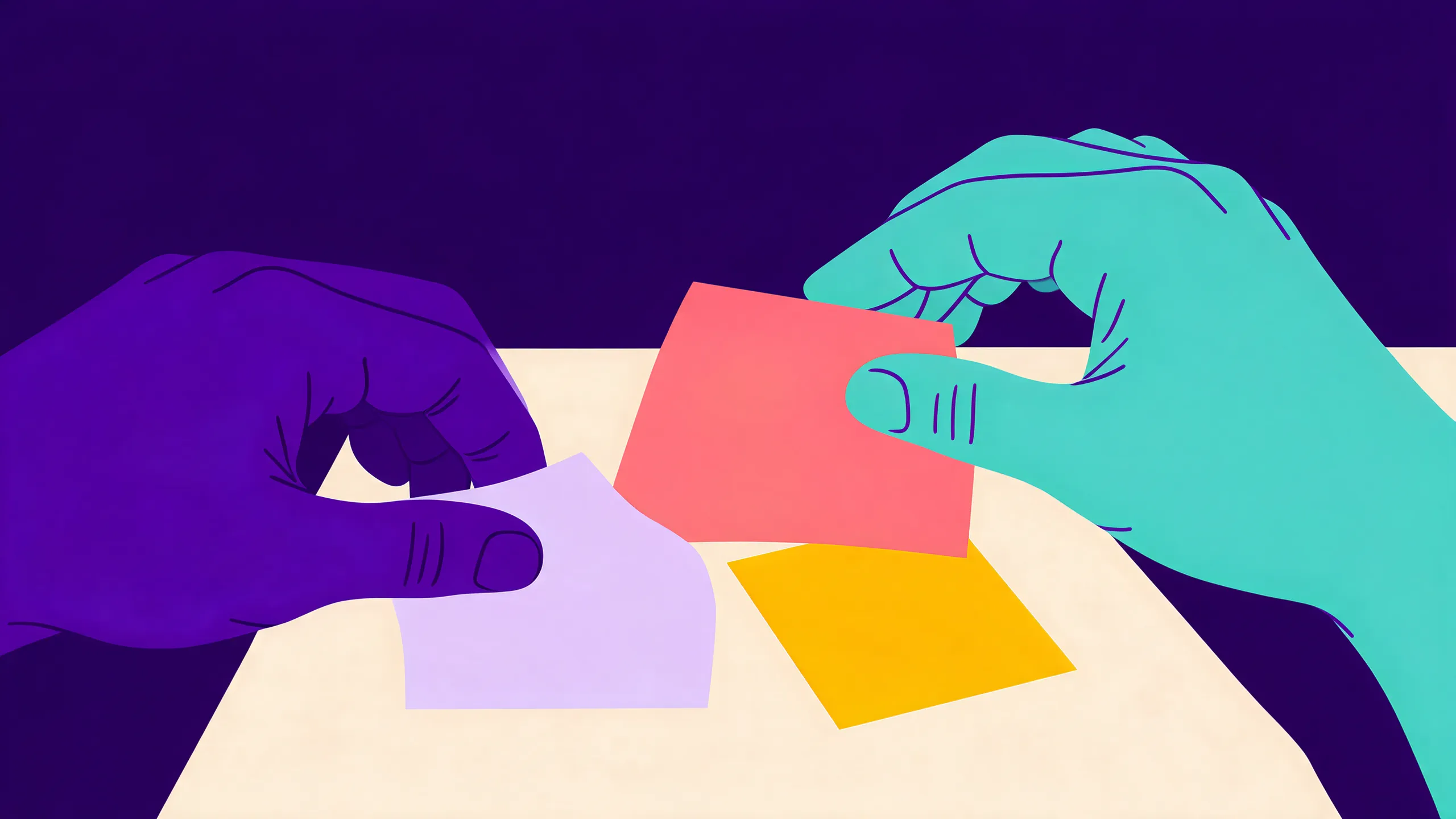 Dos manos colocan piezas de papel de colores sobre una mesa para componer un diseño